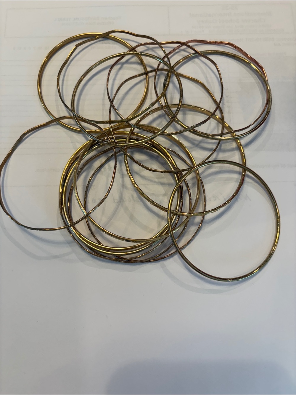 Vintage lot of 16 etched metal bracelets 2 1/4 across